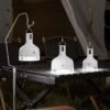 LED camping lantern 7855C/7856C/7857C in three sizes with hanging hooks for outdoor use.