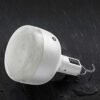 Waterproof camping lantern 7813T demonstrating water resistance and durability in rainy outdoor conditions.